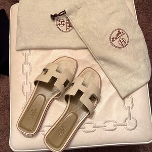 Size 8 Hermes beige sandal.  Comes with dust bags and a bag.